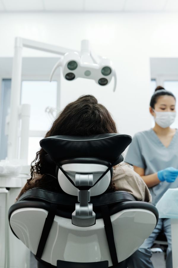 Dental hygienist with a patient — protecting health data in daily care
