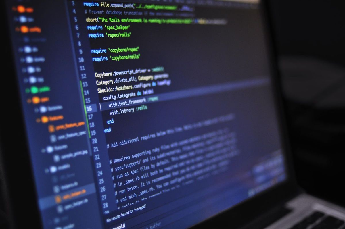 Code on a laptop screen during a security test